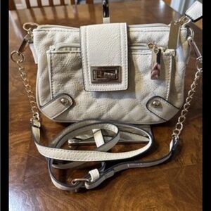 Charming Charlie Crossbody multi-pocket purse with twist closure
